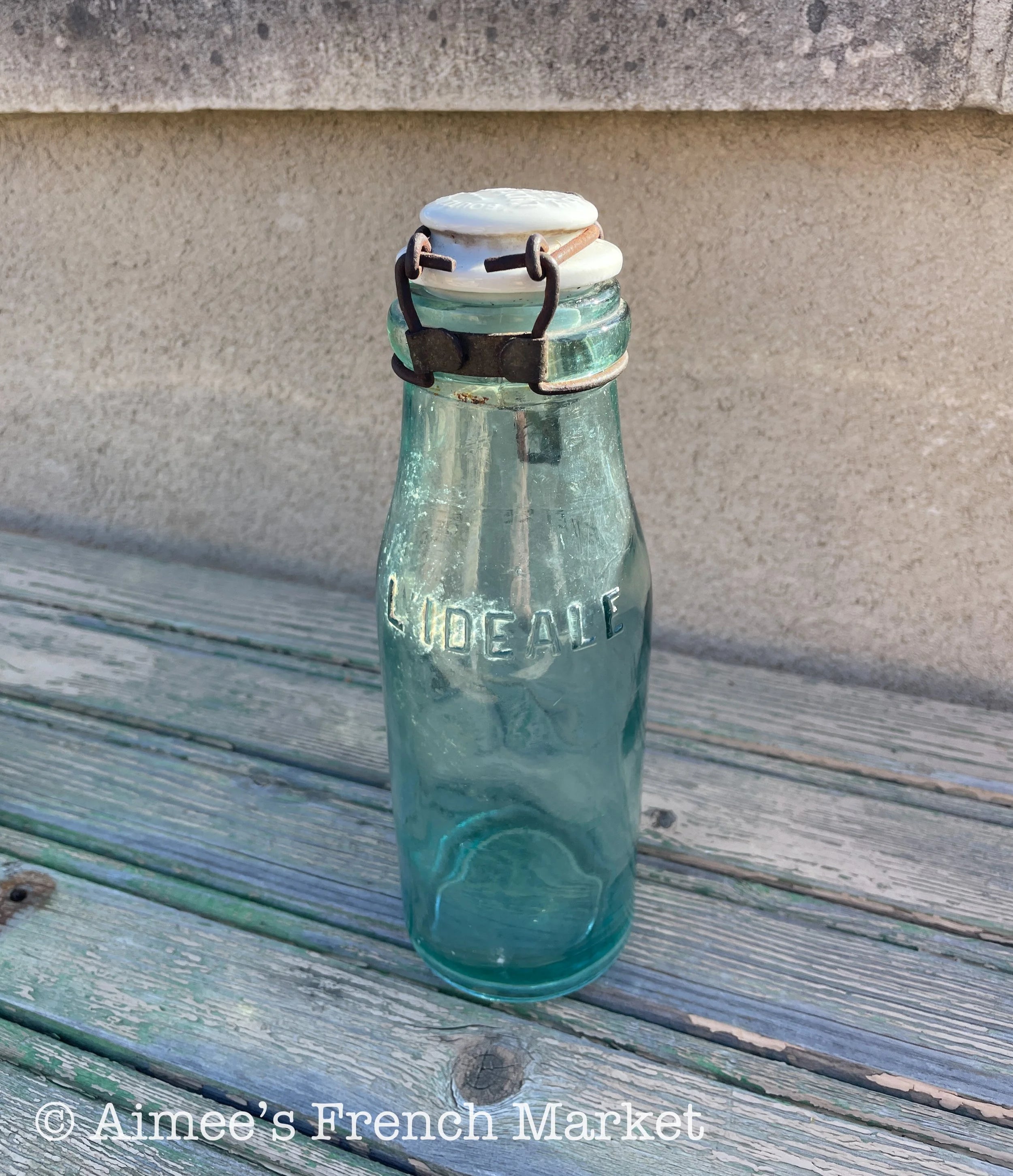 Rare French Vintage Green Glass Bottles L'Idéal with porcelain cap - 1920s