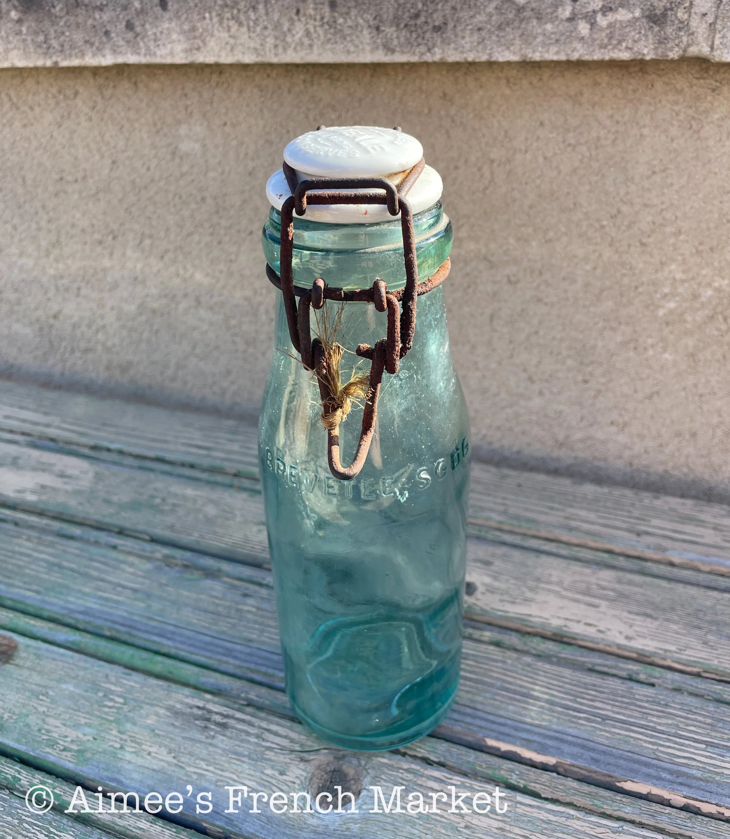 Rare French Vintage Green Glass Bottles L'Idéal with porcelain cap - 1920s